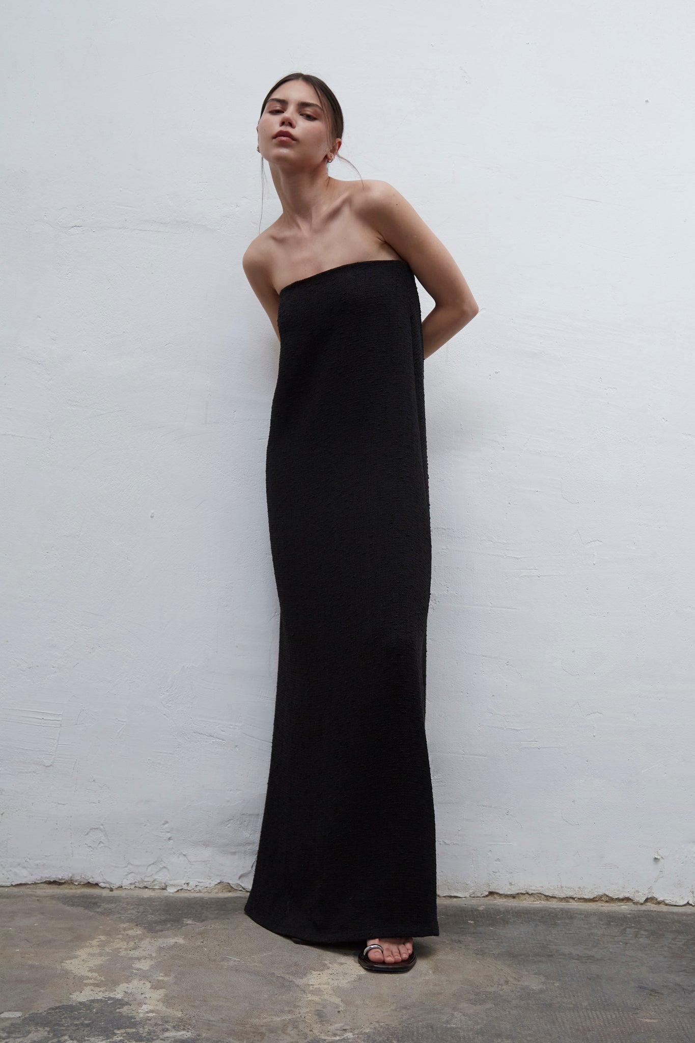 Bardot black strapless tweed dress with internal bustier and silicone bands for support, handmade in Barcelona