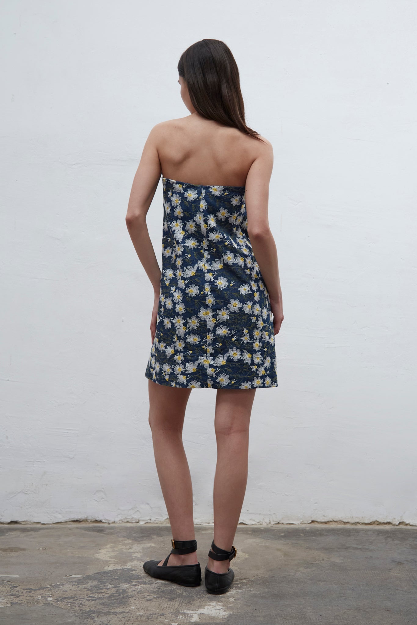 Bardot strapless mini denim dress with internal bustier and silicone bands for structured support, handmade in Barcelona