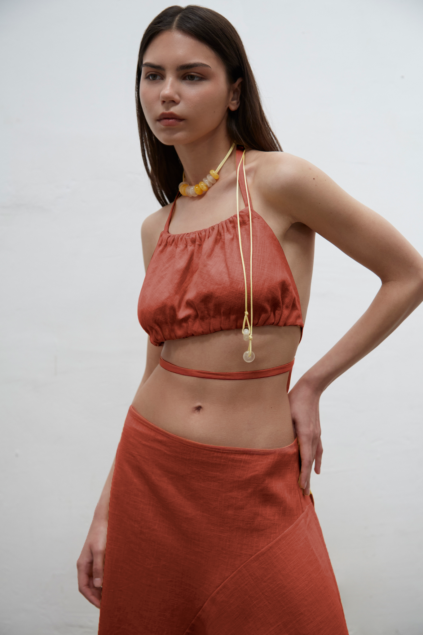 Mila terra linen mini top with adjustable ties, one-size design for sizes S to L, handmade in Barcelona