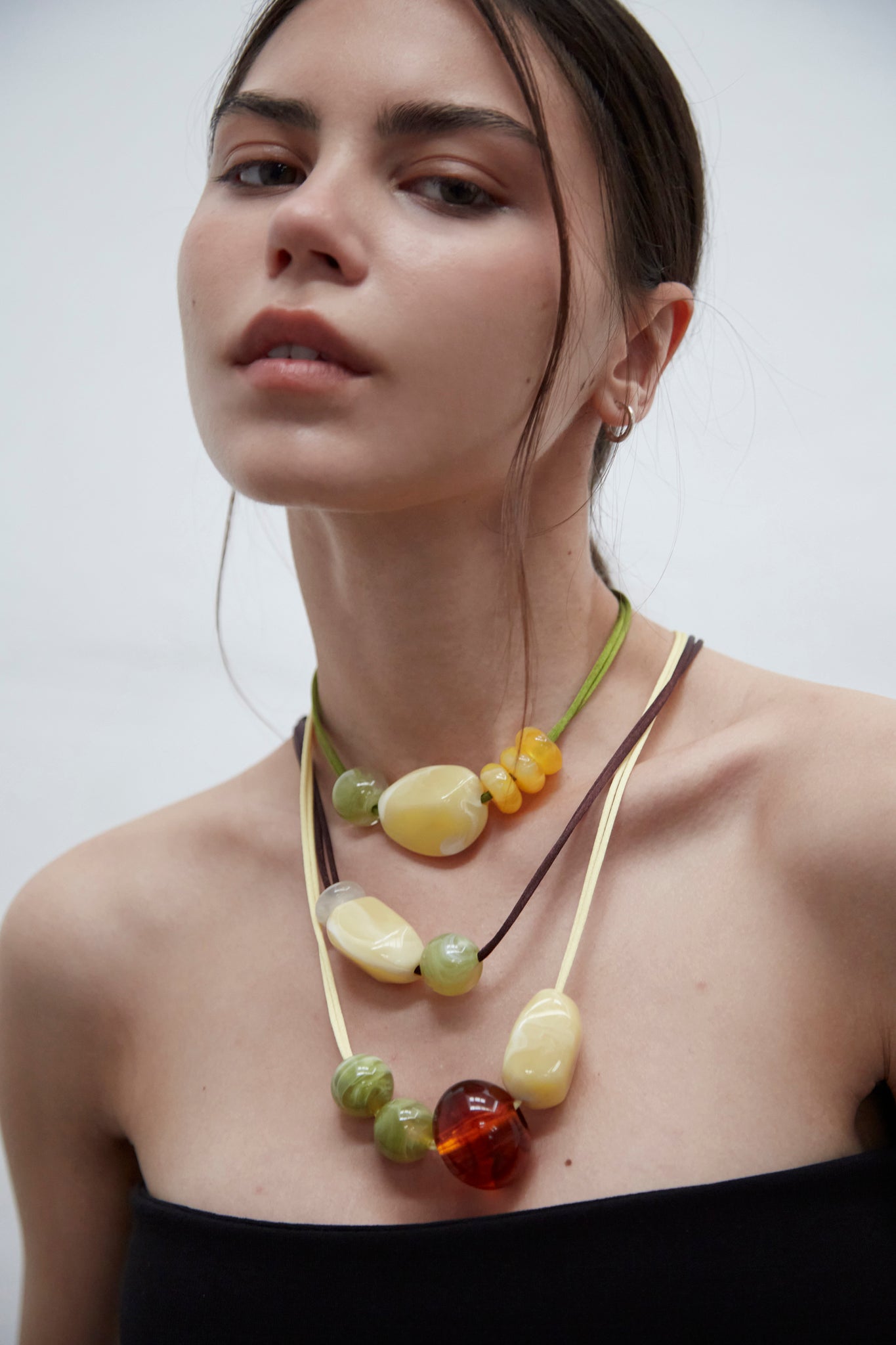 Choker crafted from glossy resin, designed to be worn as a necklace or belt, handmade in Barcelona