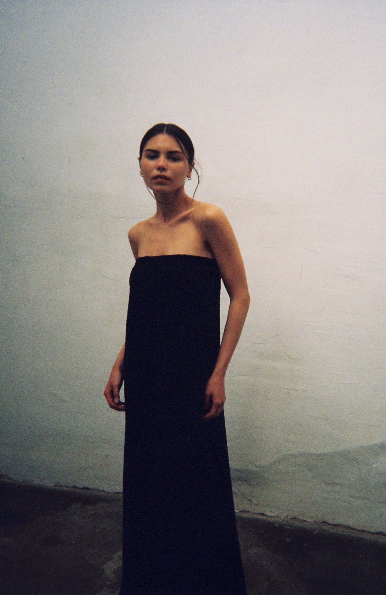 Bardot black strapless tweed dress with internal bustier and silicone bands for support, handmade in Barcelona