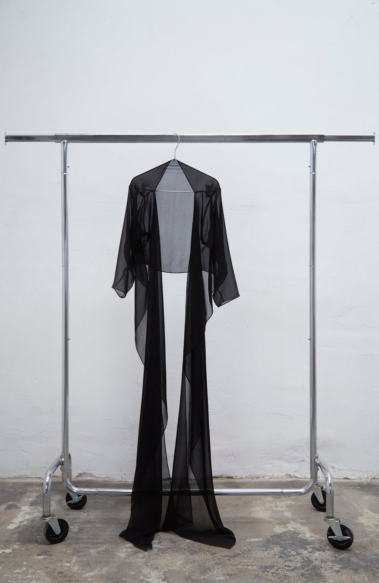 Ellie black multiway long-sleeve georgette top with fluid draped silhouette, one size fits S to L, handmade in Barcelona