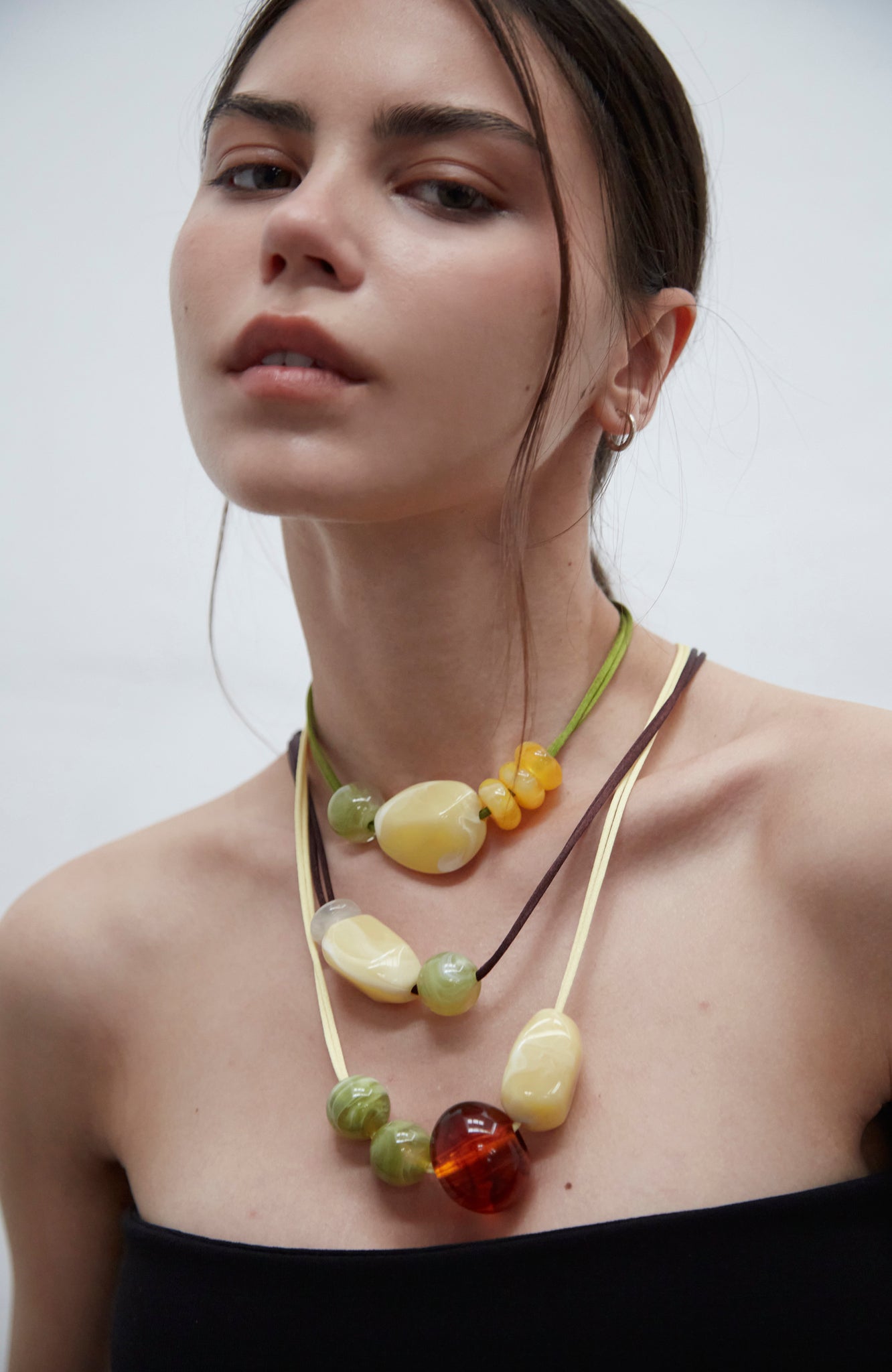 Choker crafted from glossy resin, designed to be worn as a necklace or belt, handmade in Barcelona