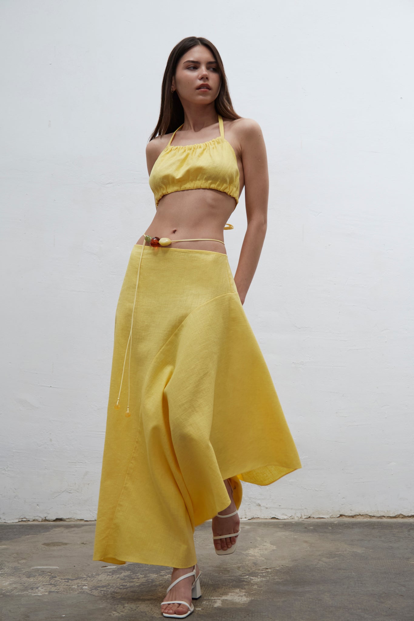 Zaha yellow asymmetric linen skirt with invisible side zipper, handmade in Barcelona
